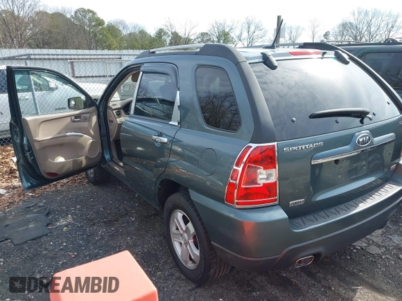 2009 Kia Sportage LX with VIN KNDJE723197563651, listed as a IAAI auction lot 41477610 with 168,797 mi miles and . Bid and sale history available at carsss.com. Image 3.