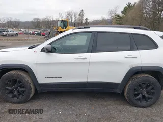2016 Jeep Cherokee Trailhawk with VIN 1C4PJMBS7GW241076, listed as a IAAI auction lot 42020124 with 151,742 mi miles and . Bid and sale history available at DreamBid. Image 14.