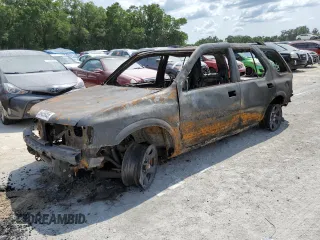 2001 Isuzu Rodeo S z VIN 4S2CK58W114309312, wystawiony jako Copart lot #56409955 z przebiegiem Nie podano mil oraz Nie do naprawy • Non repairable. Historia ofert i sprzedaży dostępna na DreamBid. Obrazek 1.