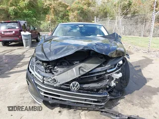 2021 Volkswagen Arteon SE z VIN WVWAR7AN5ME012022, wystawiony jako IAAI lot #41964379 z przebiegiem 30 771 mil mil oraz . Historia ofert i sprzedaży dostępna na DreamBid. Obrazek 12.