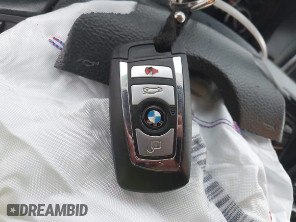 2014 BMW 5 Series 535d with VIN WBAXA5C58ED689864, listed as a IAAI auction lot 40983130 with 139,104 mi miles and . Bid and sale history available at carsss.com. Image 11.