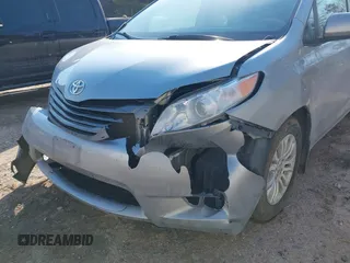 2013 Toyota Sienna XLE AAS with VIN 5TDYK3DC1DS391293, listed as a IAAI auction lot 41694041 with 181,913 mi miles. Bid and sale history available at carsss.com. Image 6.