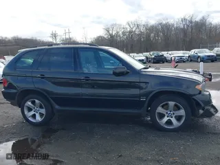 2006 BMW X5 4.4i with VIN 5UXFB53506LV22836, listed as a IAAI auction lot 41727708 with 186,084 mi miles. Bid and sale history available at carsss.com. Image 13.