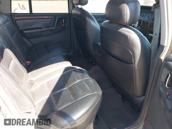 1996 Jeep Grand Cherokee Limited with VIN 1J4GZ78Y1TC162546, listed as a IAAI auction lot 42612646 with 204,098 mi miles and . Bid and sale history available at DreamBid. Image 8.