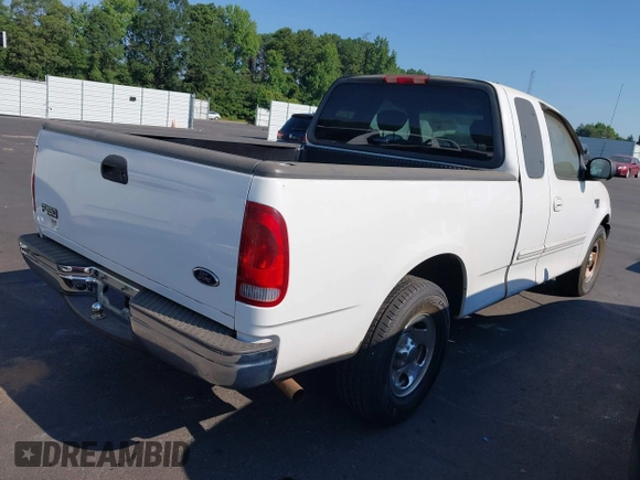 2003 Ford F-150 XL with VIN 1FTRX17W13NB93902, listed as a IAAI auction lot 42670081 with 145,918 mi miles and . Bid and sale history available at DreamBid. Image 4.