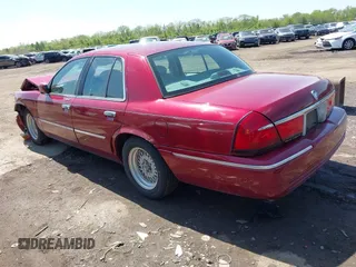 2002 Mercury Grand Marquis LS Premium z VIN 2MEFM75W22X653775, wystawiony jako IAAI lot #42225138 z przebiegiem 124 749 mil mil oraz . Historia ofert i sprzedaży dostępna na DreamBid. Obrazek 3.