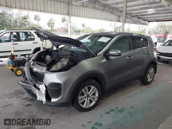 2019 Kia Sportage LX with VIN KNDPM3AC0K7561130, listed as a IAAI auction lot 41391657 with 152,728 mi miles and . Bid and sale history available at carsss.com. Image 2.