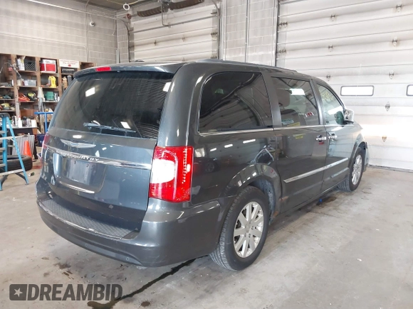 2011 Chrysler Town & Country Touring L z VIN 2A4RR8DG6BR798395, wystawiony jako IAAI lot #41084235 z przebiegiem 129 778 mil mil oraz . Historia ofert i sprzedaży dostępna na DreamBid. Obrazek 4.