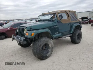 2000 Jeep Wrangler Sahara z VIN 1J4FA59S5YP803327, wystawiony jako Copart lot #44382505 z przebiegiem Nie podano mil oraz Szkoda całkowita • Salvage title. Historia ofert i sprzedaży dostępna na DreamBid. Obrazek 1.