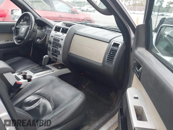 2010 Mercury Mariner Premier z VIN 4M2CN8H71AKJ14877, wystawiony jako IAAI lot #41609202 z przebiegiem 232 706 mil mil oraz . Historia ofert i sprzedaży dostępna na DreamBid. Obrazek 5.