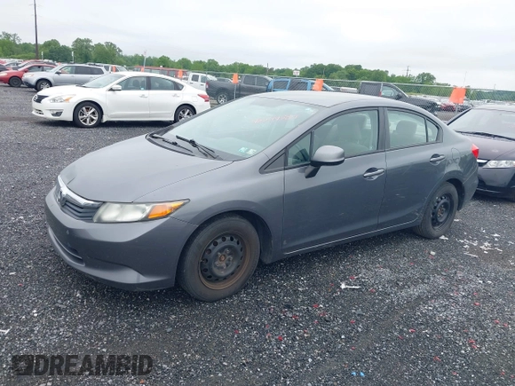 2012 Honda Civic LX with VIN 19XFB2F53CE340063, listed as a IAAI auction lot 42249889 with 291,354 mi miles and . Bid and sale history available at DreamBid. Image 2.
