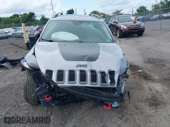 2017 Jeep Cherokee Trailhawk z VIN 1C4PJMBB8HW565462, wystawiony jako IAAI lot #42696507 z przebiegiem 114 819 mil mil oraz . Historia ofert i sprzedaży dostępna na DreamBid. Obrazek 12.