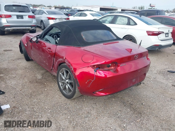 2021 Mazda MX-5 Miata Grand Touring with VIN JM1NDAD79M0454079, listed as a IAAI auction lot 41230199 with 104,783 mi miles and . Bid and sale history available at DreamBid. Image 3.