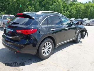 2015 Infiniti QX70 with VIN JN8CS1MW1FM482625, listed as a IAAI auction lot 42332365 with 88,912 mi miles and . Bid and sale history available at DreamBid. Image 4.