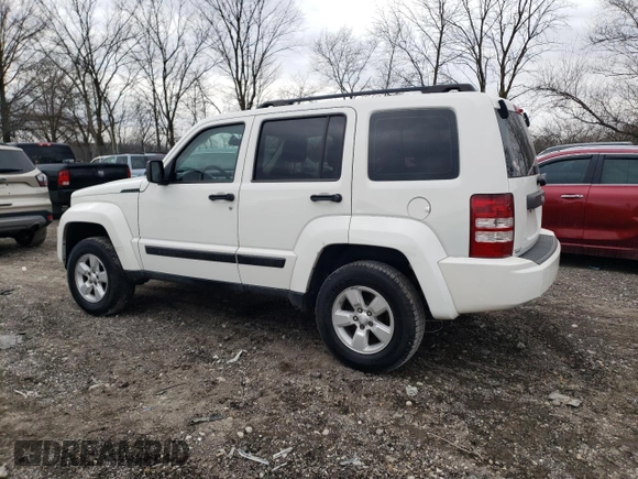 2010 Jeep Liberty Sport with VIN 1J4PP2GK9AW133958, listed as a Copart auction lot 47265675 with 124,466 mi miles and Salvage Title. Bid and sale history available at DreamBid. Image 2.