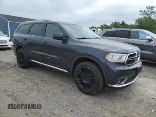 2015 Dodge Durango SXT with VIN 1C4RDJAG7FC908322, listed as a Copart auction lot 61569725 with 147,954 mi miles and Clean title. Bid and sale history available at DreamBid. Image 4.