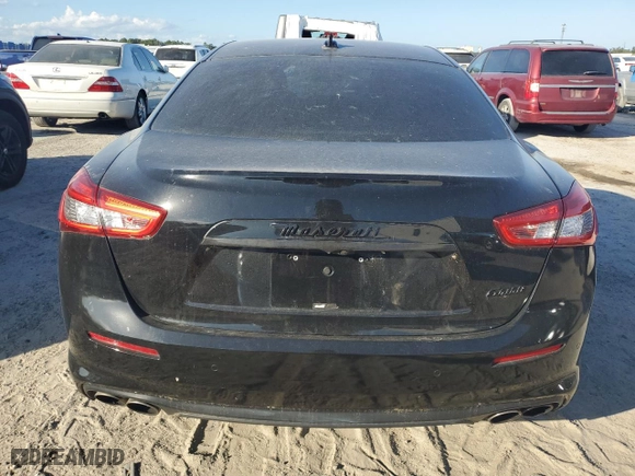2019 Maserati Ghibli with VIN ZAM57XSA9K1308602, listed as a Copart auction lot 77626594 with 18,185 mi miles and Salvage Title. Bid and sale history available at carsss.com. Image 6.