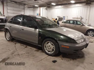 1997 Saturn SL with VIN 1G8ZH5280VZ172929, listed as a IAAI auction lot 41273214 with 134,972 mi miles. Bid and sale history available at carsss.com. Image 1.