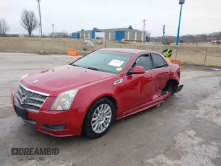 2010 Cadillac CTS Luxury with VIN 1G6DG5EG0A0134916, listed as a IAAI auction lot 41544546 with 126,769 mi miles and . Bid and sale history available at DreamBid. Image 2.