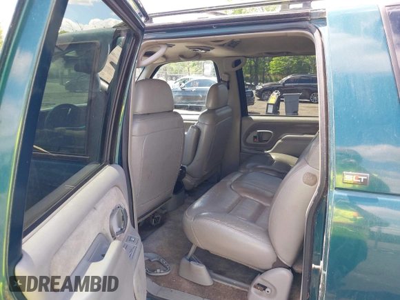 1997 GMC Suburban with VIN 1GKFK16R6VJ706590, listed as a IAAI auction lot 42194855 with 155,680 mi miles and . Bid and sale history available at DreamBid. Image 8.