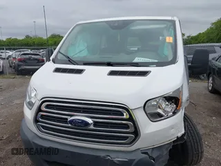 2018 Ford Transit with VIN 1FTYR1ZM2JKA98121, listed as a IAAI auction lot 42189839 with 116,414 mi miles and . Bid and sale history available at DreamBid. Image 12.