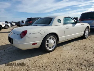 2002 Ford Thunderbird Hardtop Premium z VIN 1FAHP60A92Y103048, wystawiony jako Copart lot #73916924 z przebiegiem 75 396 mil mil oraz Szkoda całkowita • Salvage title. Historia ofert i sprzedaży dostępna na DreamBid. Obrazek 3.
