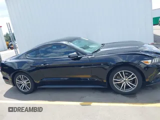 2016 Ford Mustang EcoBoost z VIN 1FA6P8TH2G5276754, wystawiony jako IAAI lot #42157727 z przebiegiem 71 174 mil mil oraz . Historia ofert i sprzedaży dostępna na DreamBid. Obrazek 13.