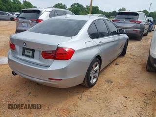 2015 BMW 3 Series 328i with VIN WBA3A5C59FP605386, listed as a IAAI auction lot 42309429 with 164,463 mi miles and . Bid and sale history available at DreamBid. Image 4.