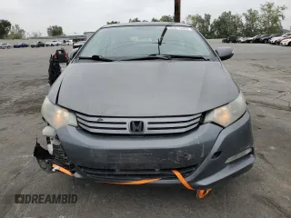 2010 Honda Insight EX with VIN JHMZE2H79AS017647, listed as a Copart auction lot 53311325 with 94,999 mi miles and Salvage Title. Bid and sale history available at DreamBid. Image 5.