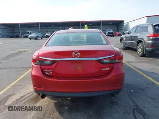 2016 Mazda 6 i Sport with VIN JM1GJ1U56G1409616, listed as a IAAI auction lot 42067647 with 158,180 mi miles and . Bid and sale history available at DreamBid. Image 16.