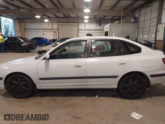 2005 Hyundai Elantra GLS with VIN KMHDN56D65U171907, listed as a IAAI auction lot 41051694 with 103,899 mi miles and . Bid and sale history available at DreamBid. Image 14.