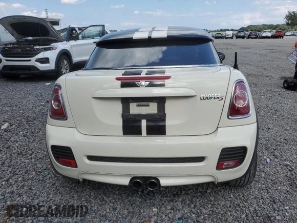 2012 MINI Coupe S z VIN WMWSX3C56CT154872, wystawiony jako Copart lot #68011264 z przebiegiem 91 650 mil mil oraz Szkody całkowita. Historia ofert i sprzedaży dostępna na DreamBid. Obrazek 6.