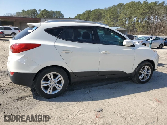 2013 Hyundai Tucson GLS with VIN KM8JU3AC1DU606047, listed as a Copart auction lot 48692885 with 185,829 mi miles and Salvage Title. Bid and sale history available at carsss.com. Image 3.