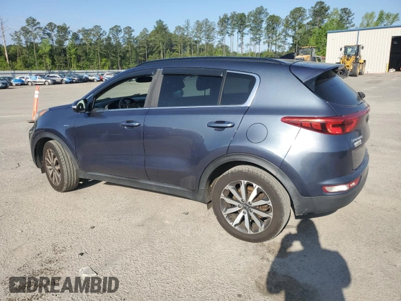2018 Kia Sportage EX with VIN KNDPNCAC3J7319878, listed as a Copart auction lot 52171425 with 100,612 mi miles and Salvage title. Bid and sale history available at DreamBid. Image 2.