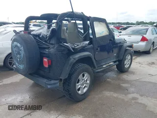 2006 Jeep Wrangler SE with VIN 1J4FA29156P739521, listed as a IAAI auction lot 42563566 with 117,281 mi miles and . Bid and sale history available at DreamBid. Image 4.