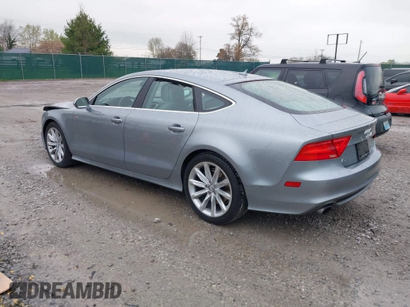 2012 Audi A7 Prestige with VIN WAU2GAFC9CN135476, listed as a IAAI auction lot 42009313 with 101,885 mi miles and . Bid and sale history available at DreamBid. Image 3.