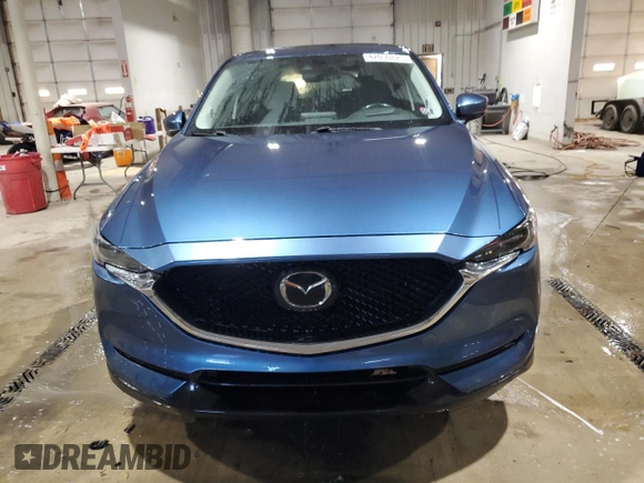 2018 Mazda CX-5 Grand Touring with VIN JM3KFBDM9J0411504, listed as a Copart auction lot 42050825 with 125,695 mi miles and Salvage Title. Bid and sale history available at carsss.com. Image 5.