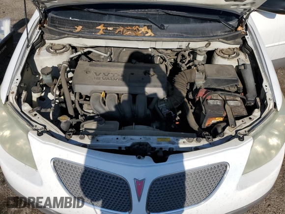 2006 Pontiac Vibe z VIN 5Y2SL65856Z452760, wystawiony jako Copart lot #56246455 z przebiegiem Nie podano mil oraz Szkoda całkowita • Salvage title. Historia ofert i sprzedaży dostępna na DreamBid. Obrazek 11.