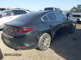 2023 Mazda 3 S Select with VIN 3MZBPABM2PM373880, listed as a IAAI auction lot 41702395 with 20,637 mi miles and . Bid and sale history available at DreamBid. Image 4.