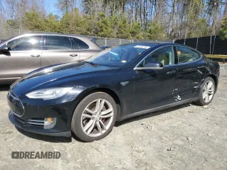 2014 Tesla Model S 60 with VIN 5YJSA1H10EFP34137, listed as a Copart auction lot 47645795 with Not provided miles and Salvage title. Bid and sale history available at DreamBid. Image 1.