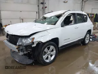 2014 Jeep Compass Sport with VIN 1C4NJDBB3ED773960, listed as a IAAI auction lot 41989986 with 126,875 mi miles. Bid and sale history available at carsss.com. Image 2.