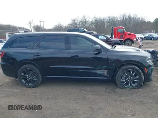 2022 Dodge Durango R/T with VIN 1C4SDJCT4NC205691, listed as a IAAI auction lot 41620362 with 55,141 mi miles and . Bid and sale history available at DreamBid. Image 13.