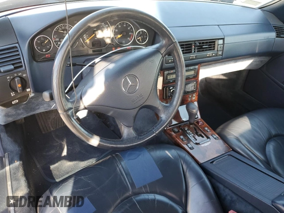 1999 Mercedes-Benz SL-Class with VIN WDBFA68F3XF183399, listed as a Copart auction lot 76908024 with 136,337 mi miles and Salvage Title. Bid and sale history available at carsss.com. Image 8.