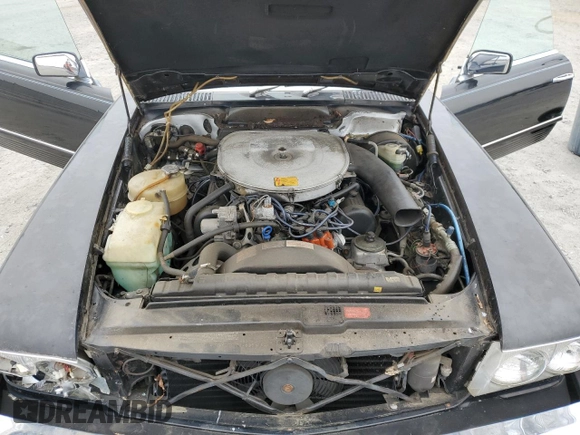 1985 Mercedes-Benz 380 z VIN WDBBA45C3FA030353, wystawiony jako Copart lot #48373455 z przebiegiem 97 471 mil mil oraz Nie do naprawy • Non repairable. Historia ofert i sprzedaży dostępna na DreamBid. Obrazek 11.