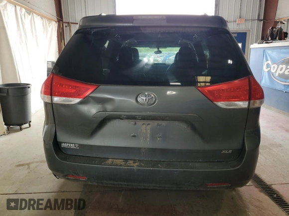 2012 Toyota Sienna XLE AAS с VIN 5TDYK3DCXCS202381, выставлен на аукционе Copart как лот 59002895 с пробегом 272 415 миль миль и Списание • Salvage title. История ставок и продаж доступна на DreamBid. Изображение 6.