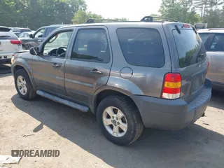 2005 Ford Escape XLT with VIN 1FMYU93155KA87661, listed as a IAAI auction lot 42491447 with 142,287 mi miles and . Bid and sale history available at DreamBid. Image 3.