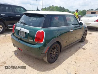 2014 MINI Hardtop with VIN WMWXM5C53ET972847, listed as a IAAI auction lot 42502121 with 165,475 mi miles and . Bid and sale history available at DreamBid. Image 4.