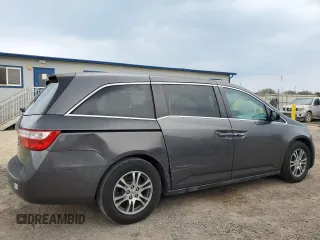 2013 Honda Odyssey EX-L with VIN 5FNRL5H68DB070079, listed as a Copart auction lot 52183895 with 173,428 mi miles and Clean title. Bid and sale history available at DreamBid. Image 3.