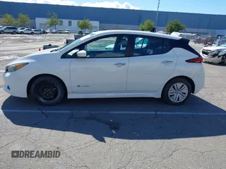 2019 Nissan LEAF SV z VIN 1N4AZ1CP0KC305899, wystawiony jako IAAI lot #41746355 z przebiegiem 31 703 mil mil oraz . Historia ofert i sprzedaży dostępna na DreamBid. Obrazek 14.