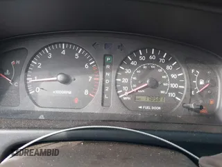 1999 Toyota Sienna LE with VIN 4T3ZF13C2XU136847, listed as a IAAI auction lot 41663608 with 178,581 mi miles. Bid and sale history available at carsss.com. Image 7.